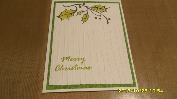I used an embossing folder on the bottom section.  The Holly leaves were colored with my Spectrum Noir Alcohol Markers