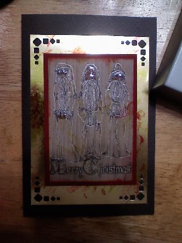 Here is a card I made with a gold mirror back with CS old santa